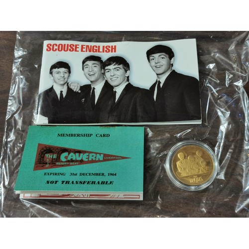 42 - Beatles memorabilia being Cavern membership card, gold coin & 'Scouse English' book