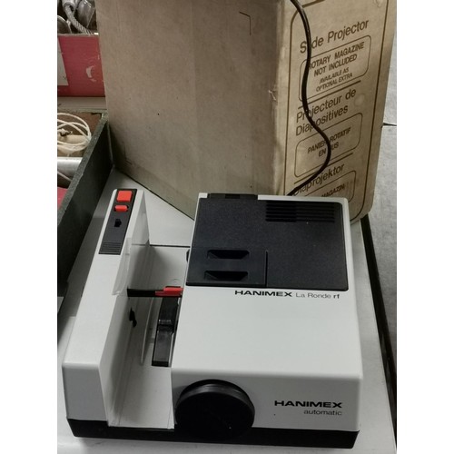 78 - Boxed Hanima La Ronde automatic slide projector - powers but needs bulb