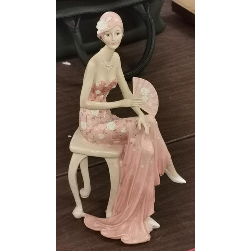 62 - 24 cm tall composite 1920's socialite sat on stool figurine