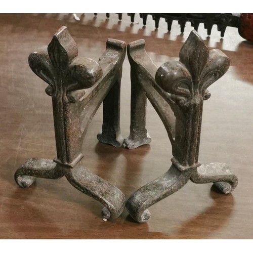 152 - Pair of 19th century fleur-de-lys top fireside dogs