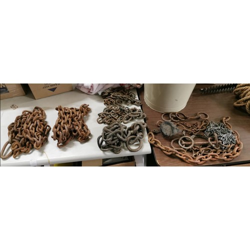 174 - Bundle of assorted length heavy duty chain