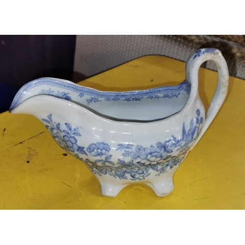 17 - Doultons Asiatic pheasant blue and white pattern gravy boat