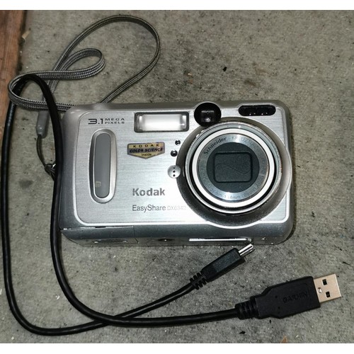 23 - Kodak EasyShare DX 6340 digital camera with USB charging cable