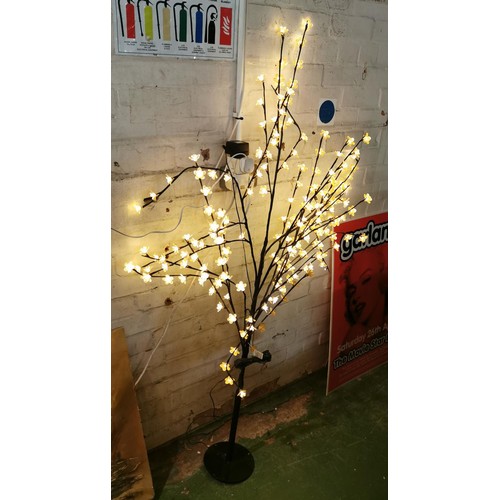 44 - Approximately 5 ft light up artificial tree