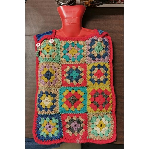 72 - Vintage hot water bottle in crocheted case