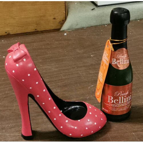 88 - Bellini peach (schnapps) stiletto bottle holder set with unopened 20 cl bottle