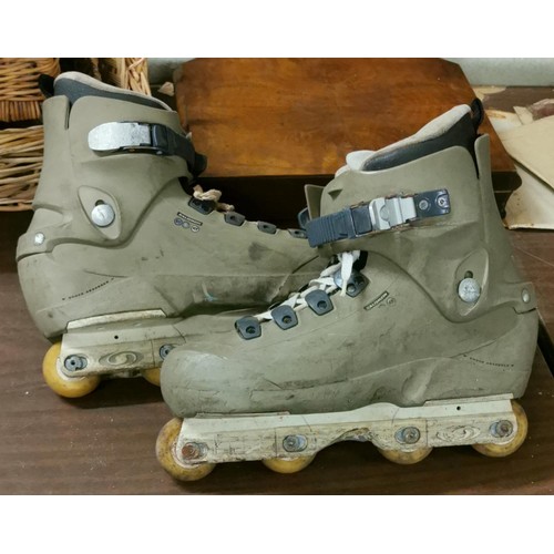 122 - Pair of Salomon inline skates approximate size 11