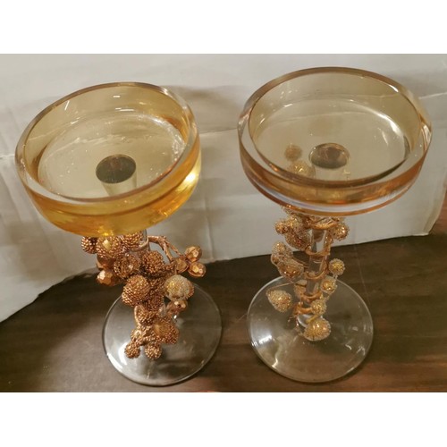 130 - Pair of 20 cm tall decorated candle glasses