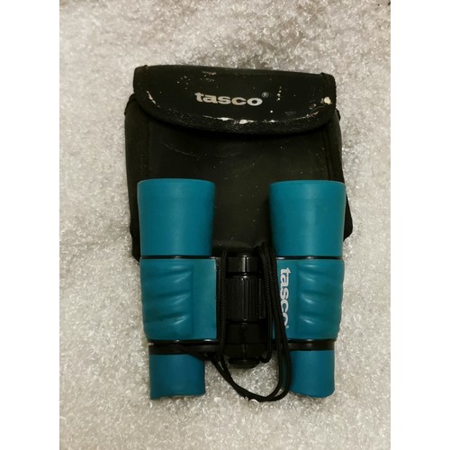 7 - Pair of Tasco 4 x 30, 1000 yd binoculars in soft case