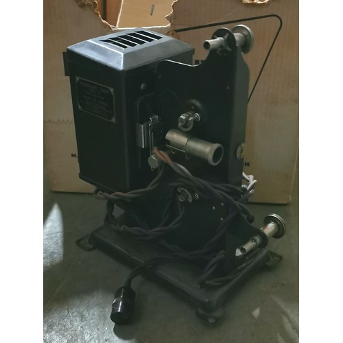 173 - Kodak Brownie Eight-58 projector in original box and with some pre-recorded film reels