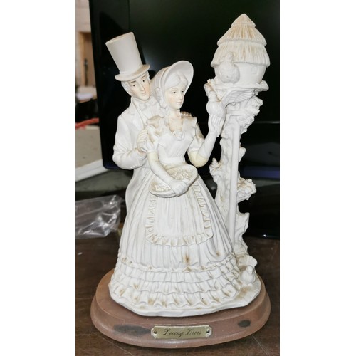 55 - 27 cm tall composite 'loving doves' parian style man and woman figure on wooden base