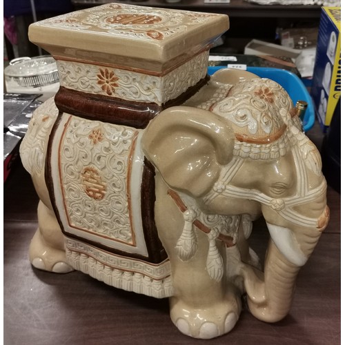 381 - 48 cm wide x 25 cm deep x 43 cm tall ornate ceramic elephant plant stand