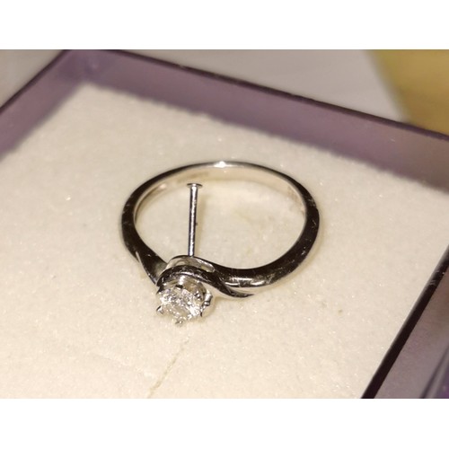 108 - 9 carat white gold diamond solitaire ring