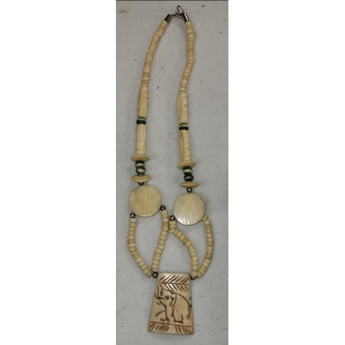 107 - Ivory coloured ethnic art necklace