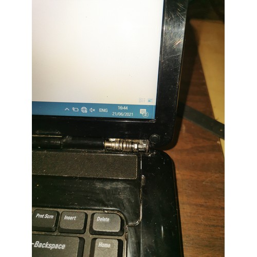 70 - Dell Inspiron 1545 laptop with power lead in working order but hinge cover missing on one side