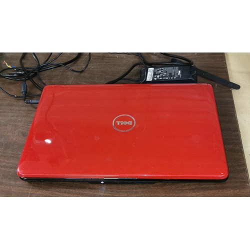 70 - Dell Inspiron 1545 laptop with power lead in working order but hinge cover missing on one side