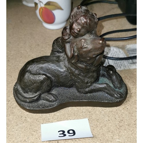 39 - 11 cm tall bronze look girl cuddling dog figure titled Polly and Patch