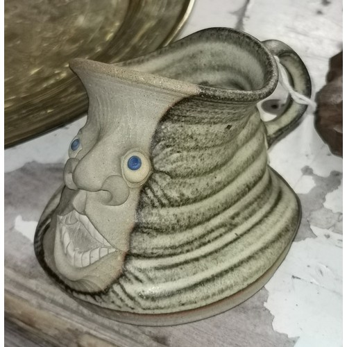 92 - 10 cm tall 1980's Muggins studio pottery collapsed face mug