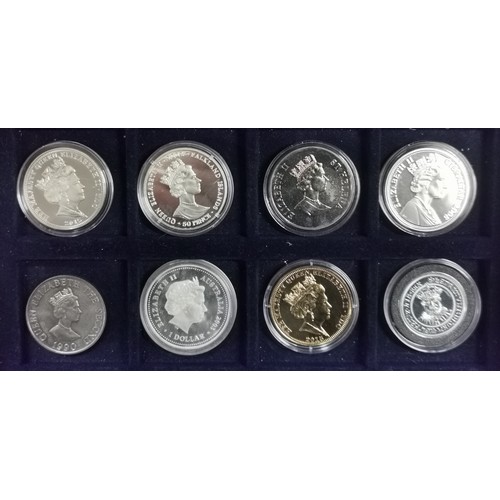 9 - Bundle of 8 x assorted commemorative in wooden coin display case, mainly in perspex cases but no COA... 