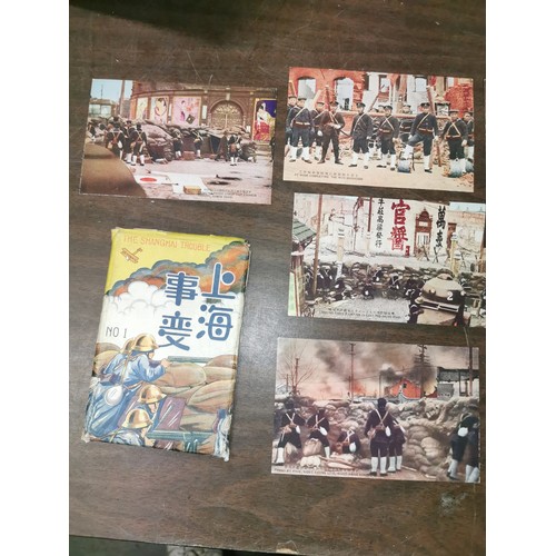 132 - 1940's The Shanghai Trouble number 1 postcard set (16 total) in original sleeve and in excellent con... 