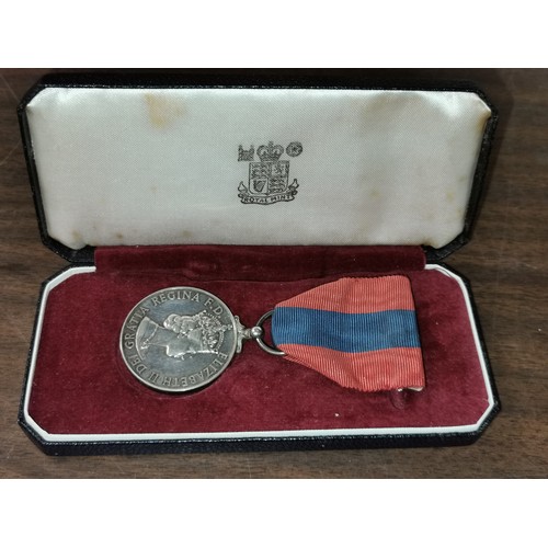 12 - Imperial service medal in case engraved on edge 'Ellis Sparshott Rowland'