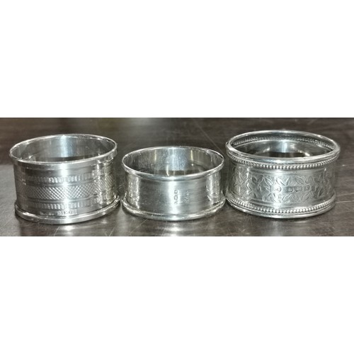 51 - 3 x assorted hallmarked silver patterned napkin rings