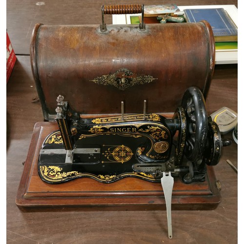 323 - 19th century very early Singer sewing machine in very good condition and moving freely, complete wit... 