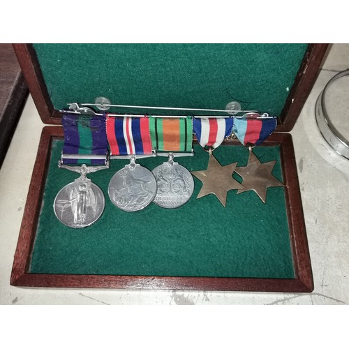 21 - Band of 5 x WWII medals in box, engraving on edge reads '1923133 CPL.W.RIGBY.RE'