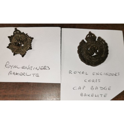 59 - 2 x Bakelite royal engineer corps cap badges