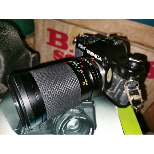 23 - Retro Yashica FX-3 35 mm camera with 55 mm Yashica lens and Vivitar 28-85 mm lens in canvas carry ba... 