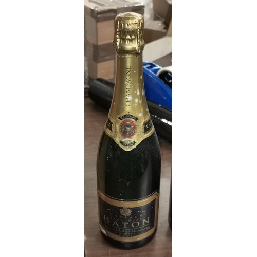 12 - Unopened Haton 750 ml classic brut champagne