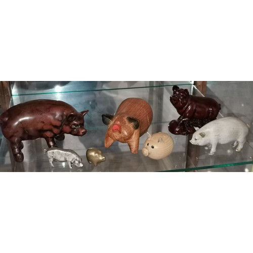 40 - Nice bundle of assorted size wooden, metal, ceramic and composite pig figures