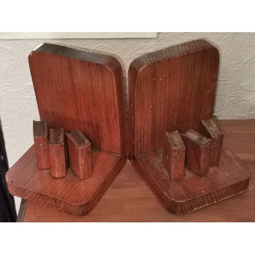 49 - Pair of wooden book ends with books detail