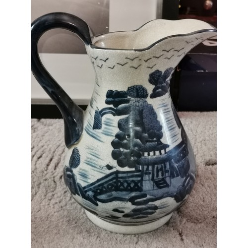 74 - Ironstone blue and white picture pattern wash bowl and water jug