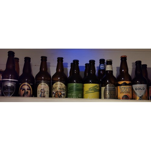 205 - Large job lot of assorted empty speciality beer and ale bottles