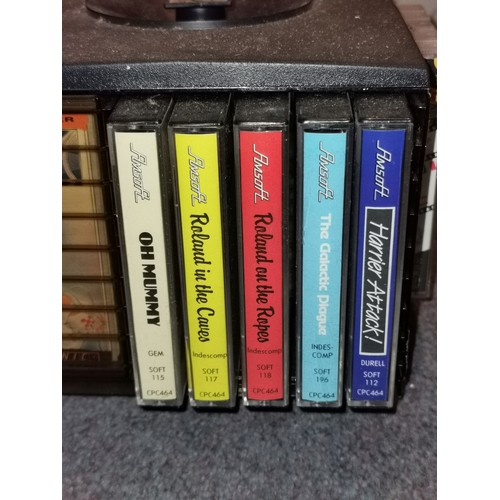 253 - Tape carousel containing 20 x assorted Amstrad games