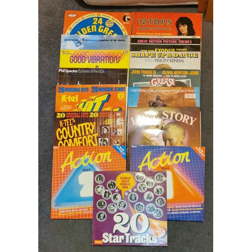 282 - Job lot of mainly 1970's compilation and sountrack vinyl albums and mainly 1980's chart music single... 