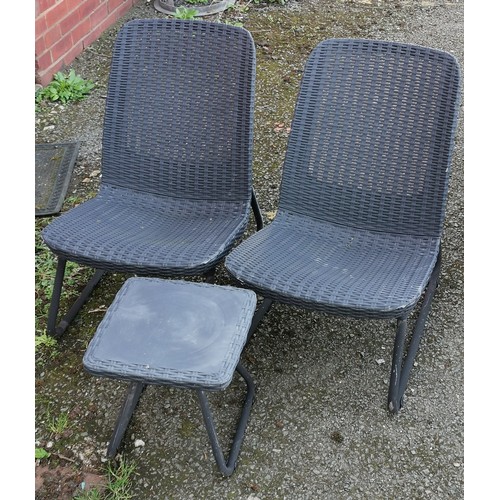 462 - Pair of plastic wicker look low garden chairs and matching side table