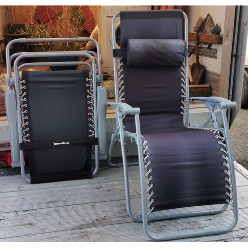 465 - Pair of folding lounger chairs