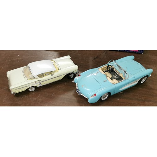 39 - Die cast car bundle of 1960 Jaguar mk.2 on stand, 5 x Shell Ferraris boxed, 2 x larger scale cars an... 