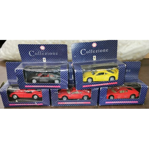 39 - Die cast car bundle of 1960 Jaguar mk.2 on stand, 5 x Shell Ferraris boxed, 2 x larger scale cars an... 