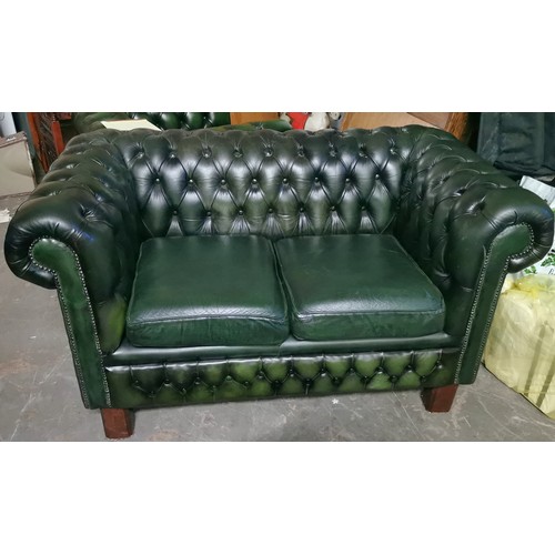 210 - Racing green 2 seater mid back Chesterfield couch on legs