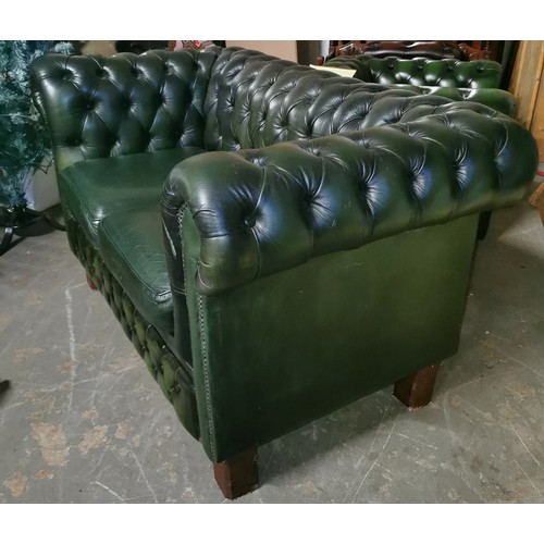 210 - Racing green 2 seater mid back Chesterfield couch on legs