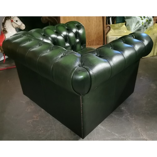 209 - Racing green Chesterfield club chair on castors