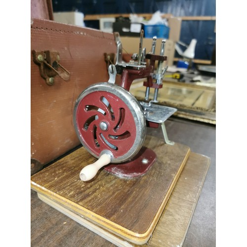 52 - Vintage Essex miniature sewing machine in case - winds freely