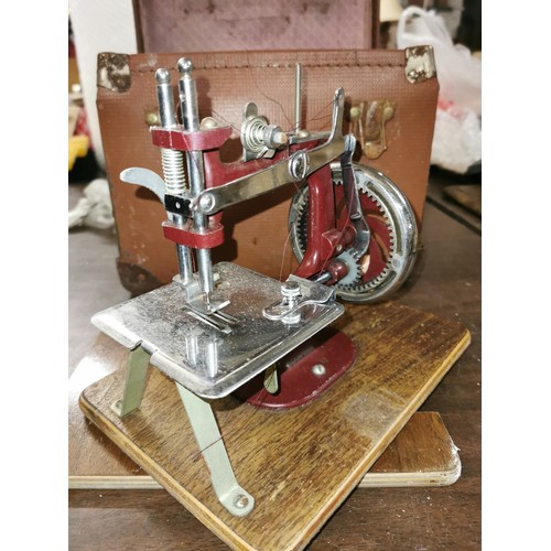 52 - Vintage Essex miniature sewing machine in case - winds freely