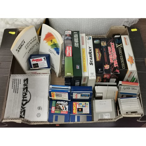 49 - Retro gaming job lot of Amiga 500/600/1200 boxed disc games and 100 floppy discs