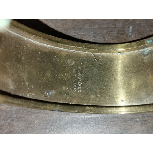 63 - Feb 15th 1882 registered brass bangle with engraved pattern