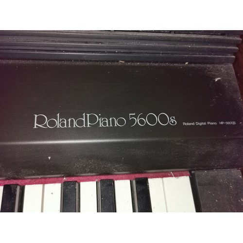 70 - Roland 88 key electric piano, model 5600s, with stool in good working order