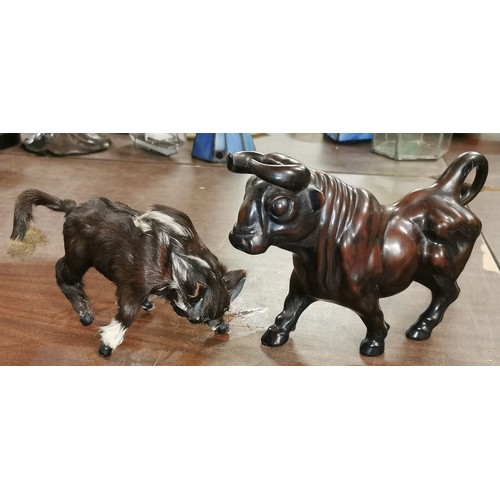 57 - 22 cm long carved look and smaller fur covered bull figures